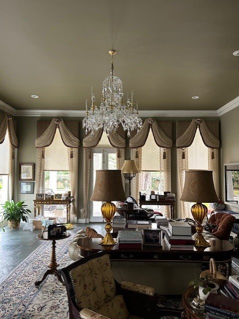 Chandelier being mounted to a ceiling during professional installation.