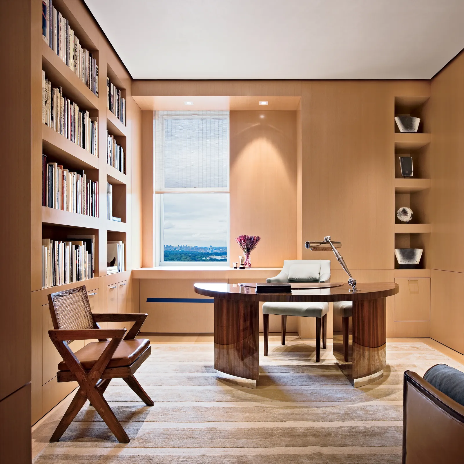 Stylish work-from-home office with wood desk and smart lighting.