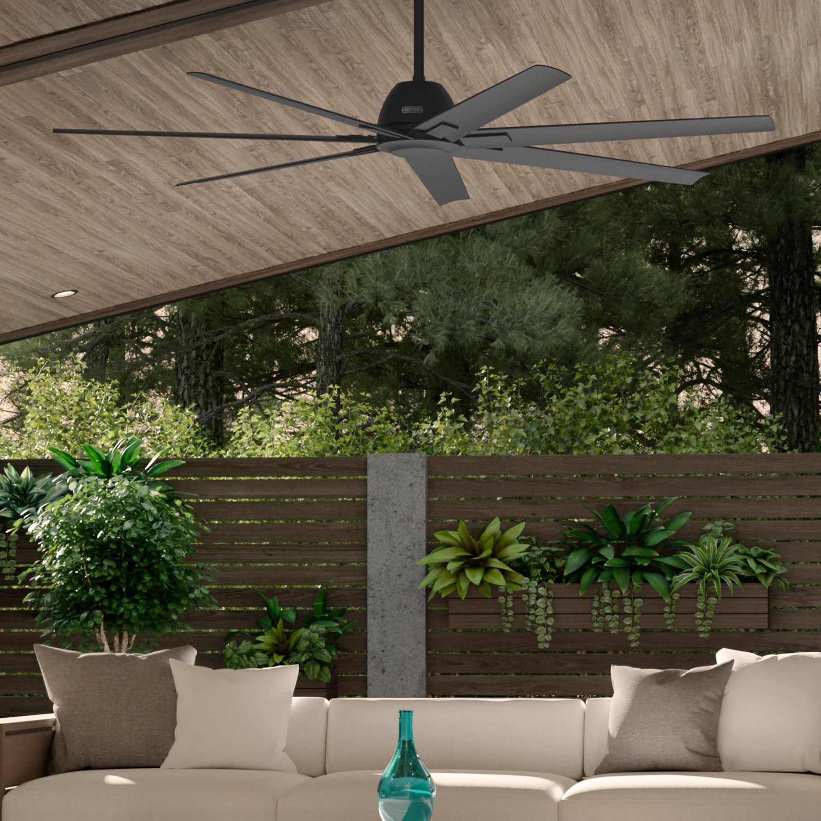 Outdoor ceiling fan installed on a patio, providing a cool breeze and enhancing the outdoor living space.
