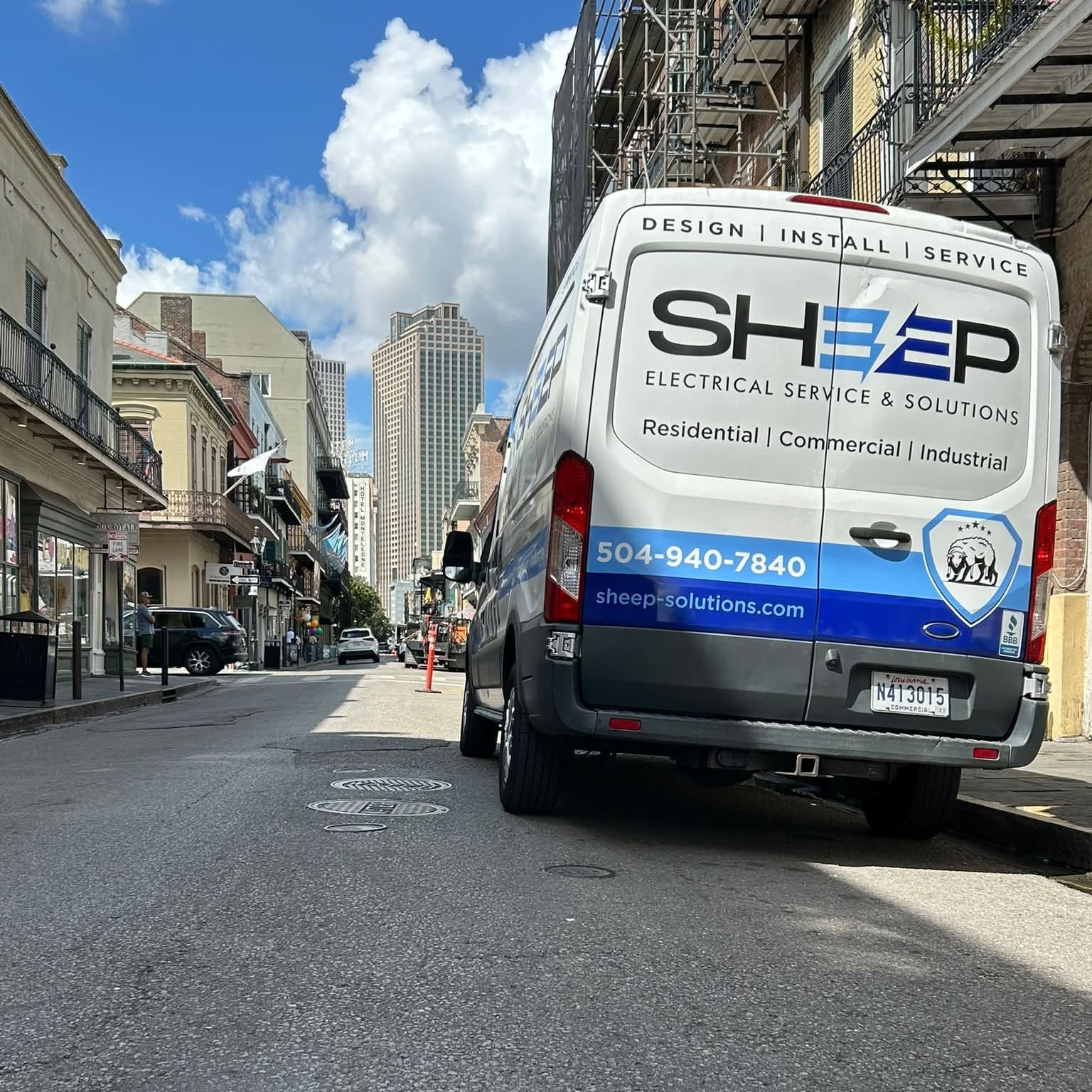 Sheep Electrical Service & Solutions van providing licensed commercial electrical service in downtown New Orleans.