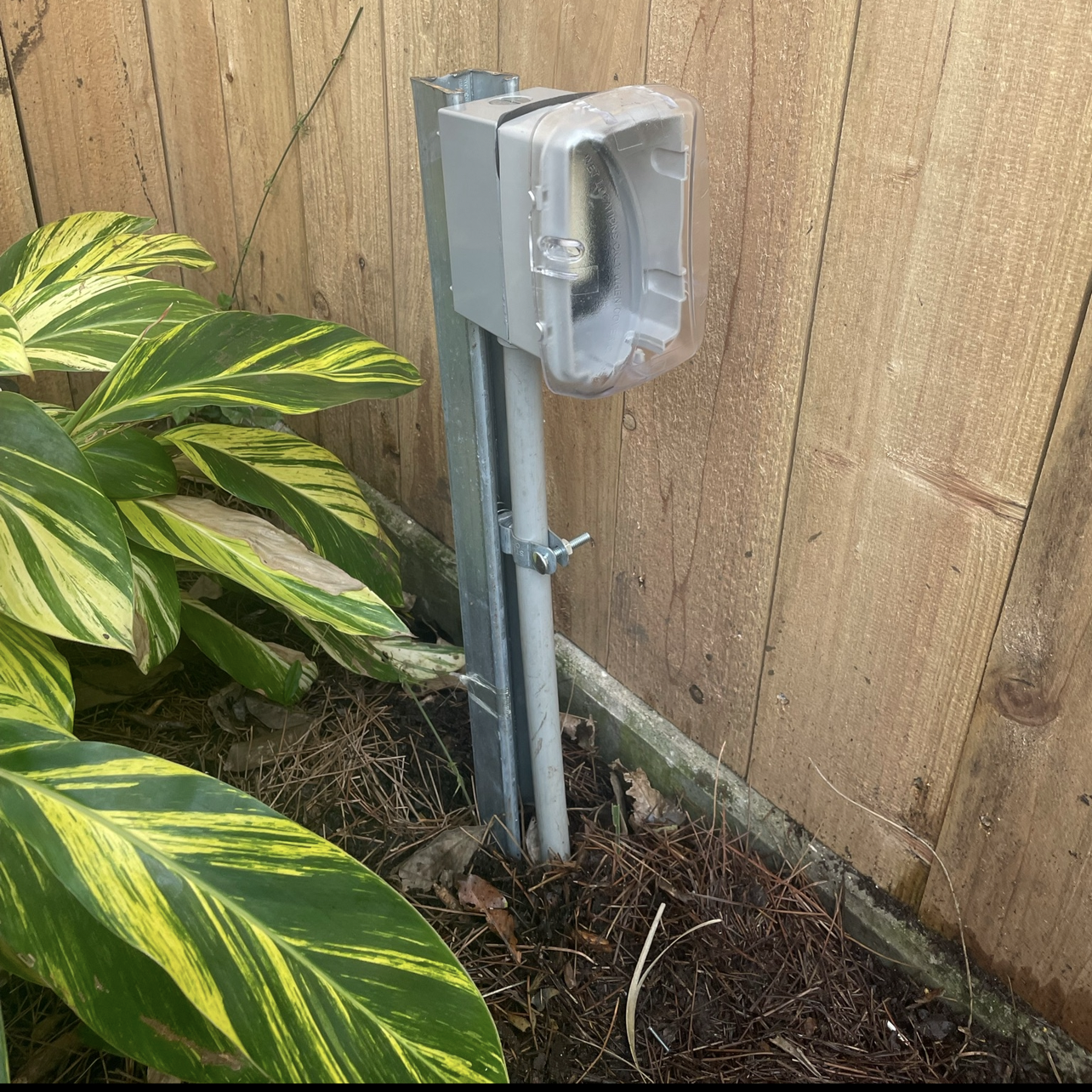 Two covered outdoor receptacles installed on a dedicated electrical circuit